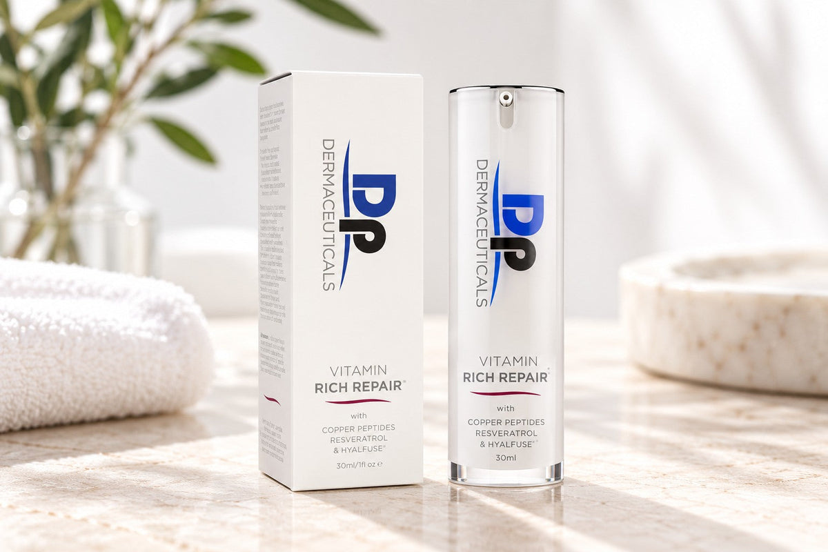 DP Dermaceuticals Vitamin Rich Repair 30ml hydrating skincare serum and packaging displayed on a marble surface in a bright, minimalist skincare setting.