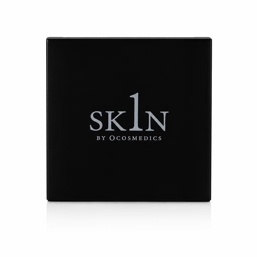 O Cosmedics 1SKIN BLUR Finishing Powder 6g in black square compact with silver 1SKIN branding, translucent soft matte face powder.
