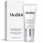 Medik8 Advanced Day Eye Protect 15ml age-defying eye cream with sunscreen, displayed in a white tube with silver applicator and original product packaging on a white background.