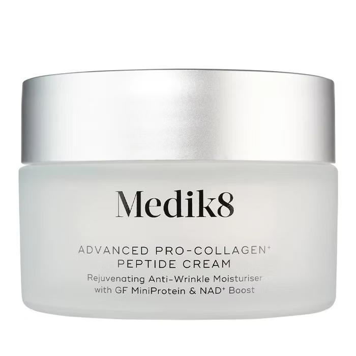 Medik8 Advanced Pro-Collagen+ Peptide Cream 50ml anti-wrinkle facial moisturiser in a white jar with silver lid, featuring GF MiniProtein and NAD+ Boost. Copy
