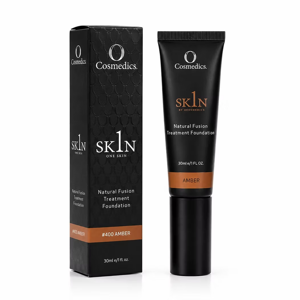 O Cosmedics 1SKIN Natural Fusion Treatment Foundation in Amber 400 shade, 30 mL black foundation tube displayed alongside matching product packaging on a white background.