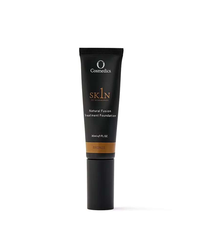O Cosmedics 1SKIN Natural Fusion Treatment Foundation in Bronze #600, 30mL black tube, front view on a white background.