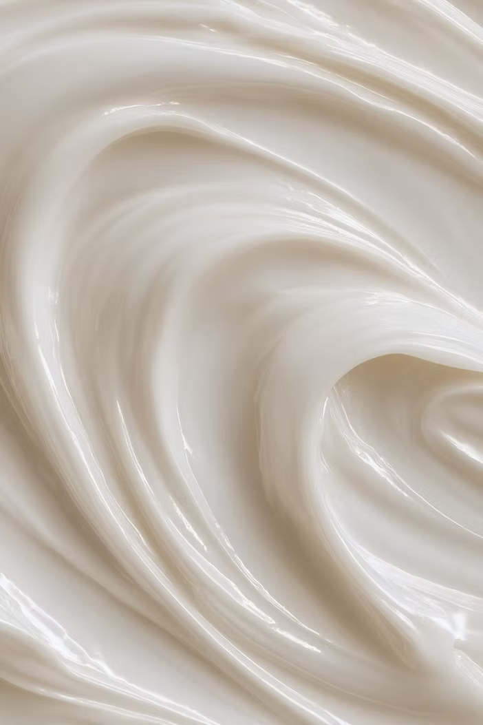 Close-up of smooth skincare lotion texture illustrating the consistency of DP Dermaceuticals CLR Lotion.