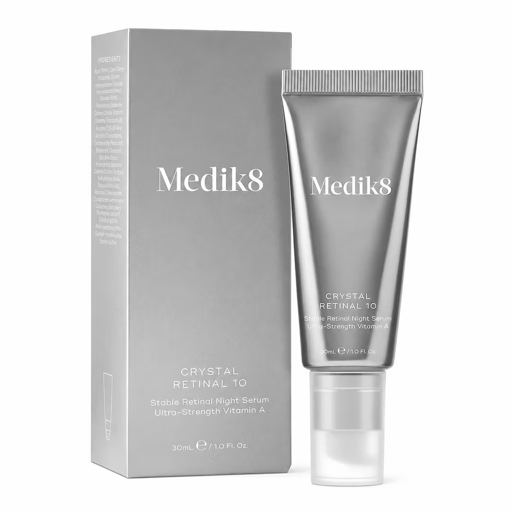 Medik8 Crystal Retinal 10 Night Serum 30ml silver tube with original packaging, ultra-strength vitamin A retinal skincare serum on white background.