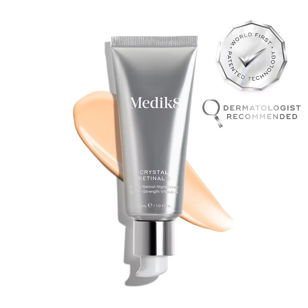 Medik8 Crystal Retinal 6 Night Serum 30ml silver tube with peach-coloured serum texture, patented technology emblem and dermatologist recommended graphic.