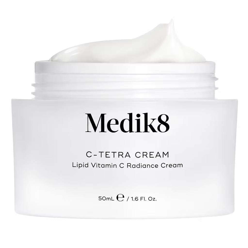 Medik8 C-Tetra Cream 50ml Lipid Vitamin C Radiance Cream in an open white jar, showcasing its rich, creamy texture against a clean white background.