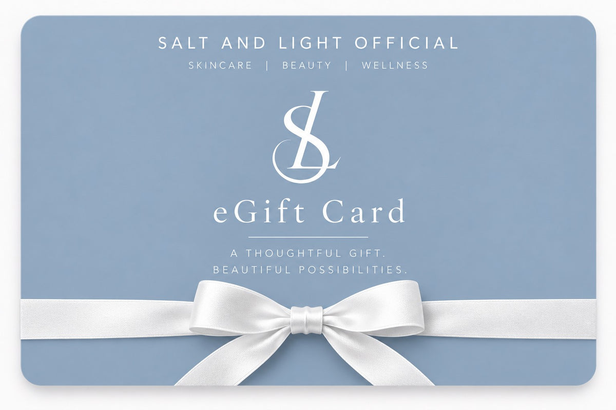 Salt and Light Official digital gift card in soft blue with white SL logo, elegant typography and white satin ribbon bow, for skincare and beauty gifting.
