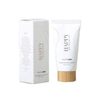 Ginger & Me Happy Brightening Hand Cream 50ml tube displayed beside its white retail packaging.