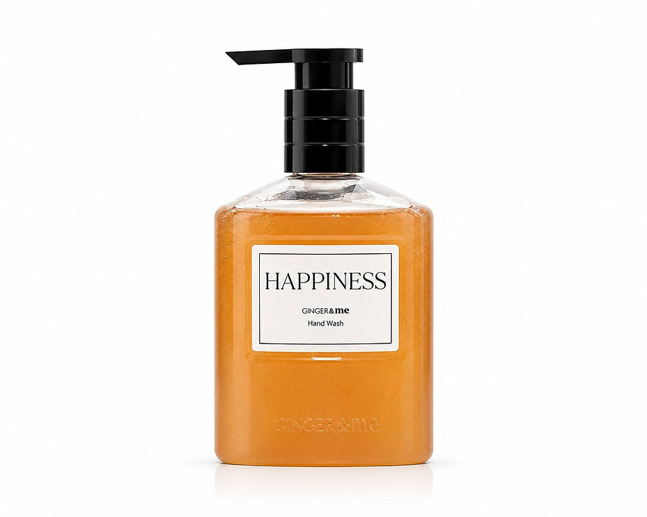 Ginger & Me Happiness Hand Wash 400ml in an amber-coloured pump bottle with black dispenser on a white background.