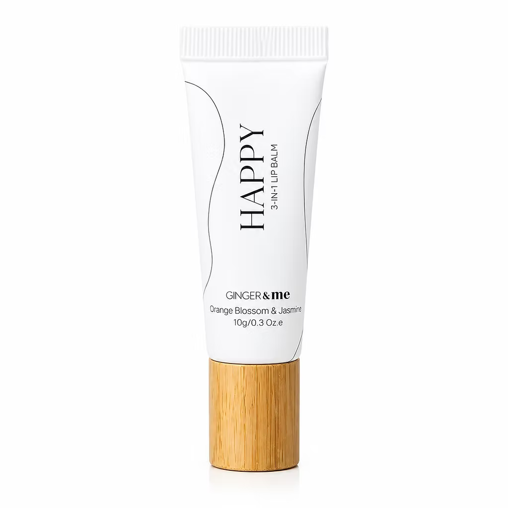 Ginger & Me Happy 3 In 1 Lip Balm 10ml in a white squeeze tube with natural wood-look cap.