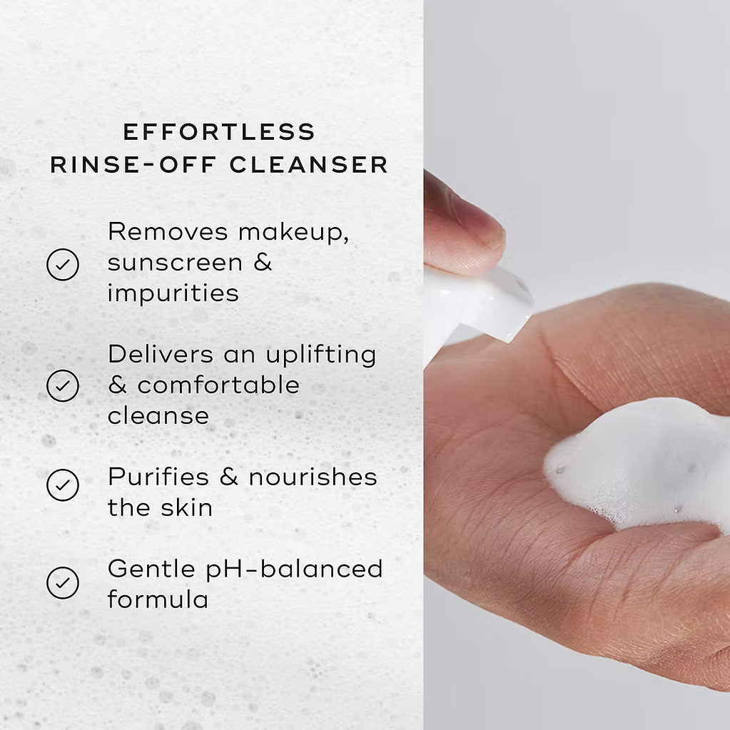 Medik8 gentle rinse-off foaming cleanser removing makeup, sunscreen and impurities with a nourishing, pH-balanced formula. Image shows foam texture and key cleansing benefits.