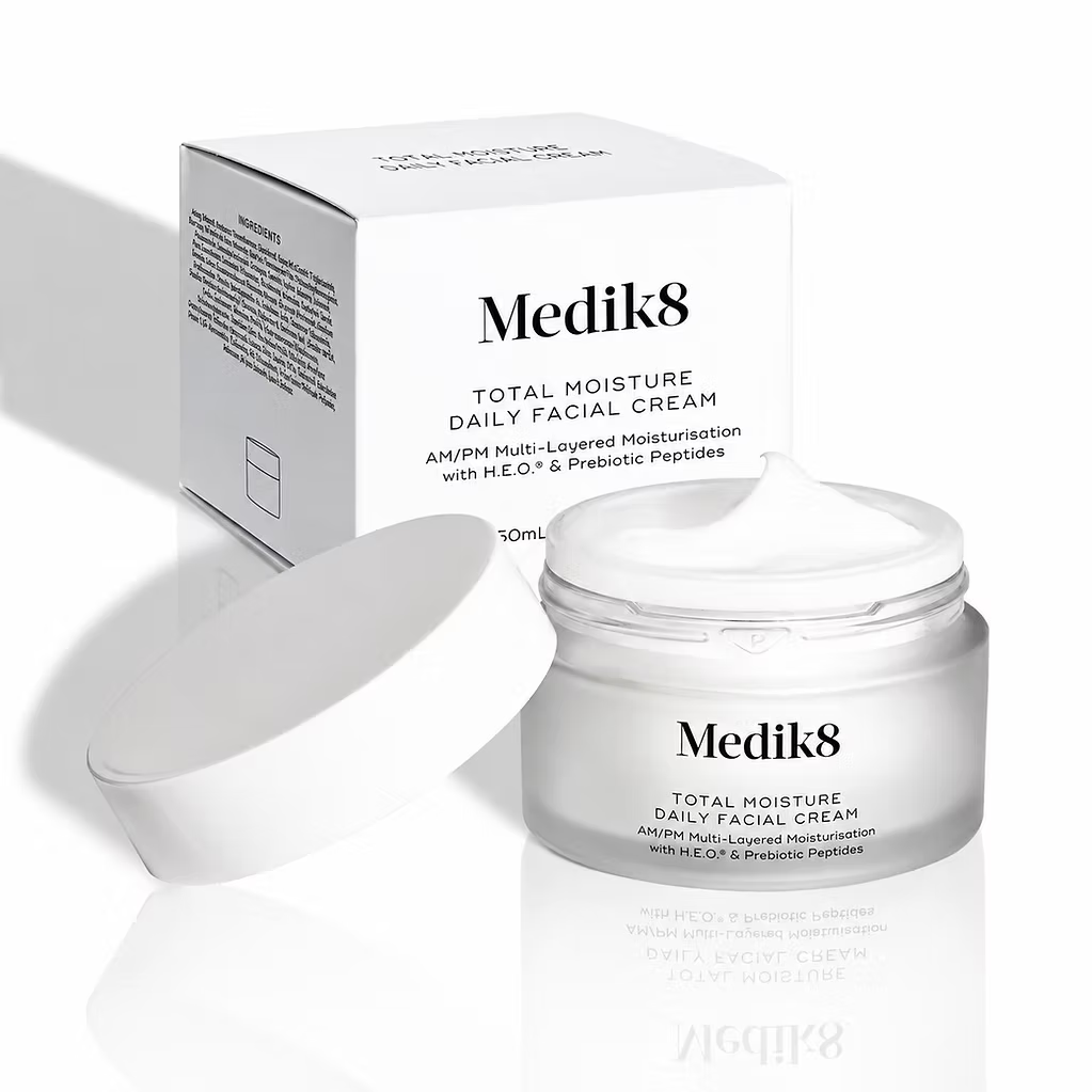 Medik8 Total Moisture Daily Facial Cream 50ml in an open jar showing rich white moisturising cream, with lid and original product packaging.
