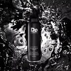 DP Dermaceuticals EXO-GROW Scalp Mask 150ml black bottle displayed against a glossy black water background, professional exfoliating scalp treatment.