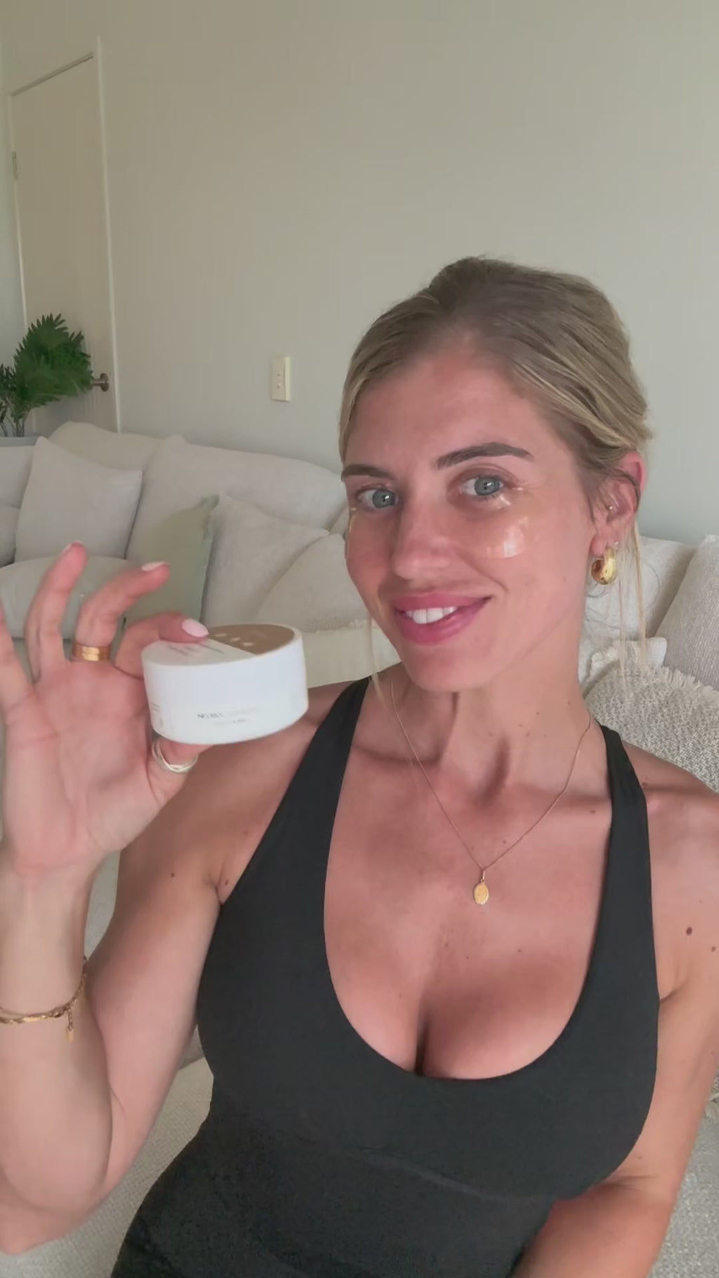Woman demonstrating Ginger & Me Hydra-Glow Eye Masks as part of her skincare routine.